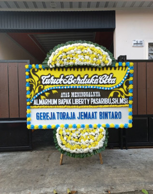 Papan Bunga Duka di Baiya